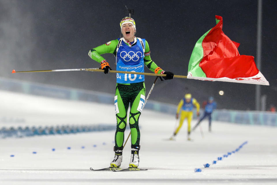 Darya Domracheva, of Belarus, skis across the finish line for the gold medal during the Women’s 4×6-km Biathlon Relay at the 2018 Winter Olympics in PyeongChang, South Korea, on Feb. 22, 2018. (AP Photo/Andrew Medichini)