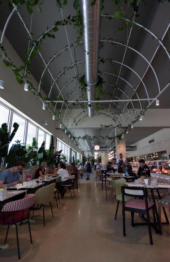 View of the dining area from the main entrance of CalaMillor Gourmet Experience in Miami.