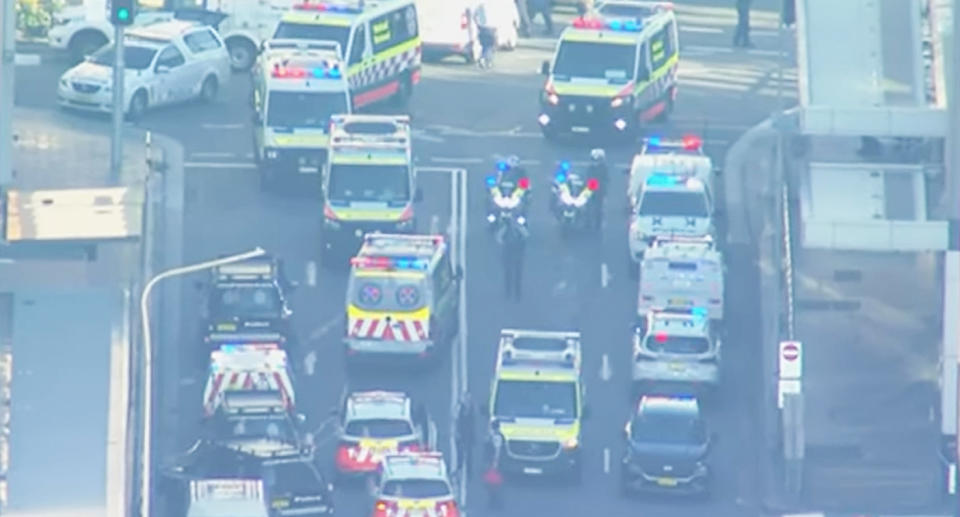 Ambulances and police cars outside the shopping centre. Source: ABC