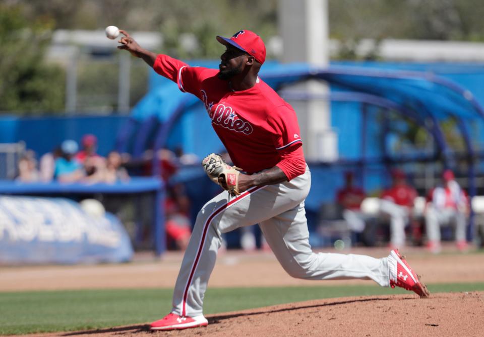 Philadelphia Phillies relief pitcher Enyel De Los Santos throws in the second inning during a spring training baseball game against the Toronto Blue Jays, Thursday, Feb. 28, 2019, in Dunedin, Fla. (AP Photo/Lynne Sladky)