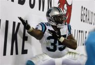 Oct 24, 2013; Tampa, FL, USA; Carolina Panthers fullback Mike Tolbert (35) reacts after he scored a touchdown during the second half against the Tampa Bay Buccaneers at Raymond James Stadium. Kim Klement-USA TODAY Sports