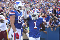 Buffalo Bills' Dawson Knox (88) celebrates with Emmanuel Sanders (1) after Sanders caught a pass for a touchdown during the second half of an NFL football game against the Washington Football Team, Sunday, Sept. 26, 2021, in Orchard Park, N.Y. (AP Photo/Jeffrey T. Barnes)