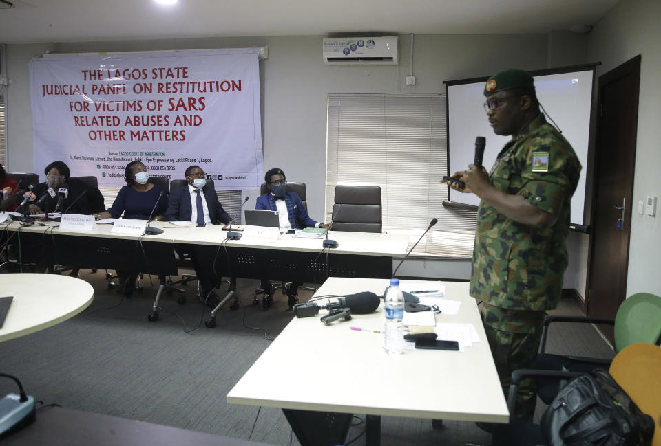 In this photo taken on Saturday Nov. 14, 2020. Brig. Gen. Ahmed Taiwo, Commander of the 81 Military Intelligence Brigade, speaks to a judicial committee over the weekend in Lagos Nigeria. Nigeria’s army has said after weeks of denial that its troop did fire shots into the air to disperse a large crowd at the Lekki Toll Plaza in Lagos where several peaceful protesters were killed late in October. (AP Photo/Sunday Alamba)