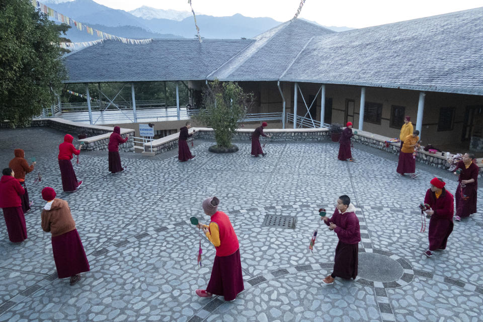 In this photo provided by the Dongyu Gatsal Ling nunnery, a group of Buddhist nuns rehearse for a ritual commonly known as Dakini Dances, at the nunnery in the state of Himachal Pradesh, India on Oct. 26, 2021. (Dongyu Gatsal Ling nunnery via AP)