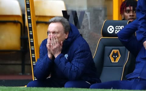 Neil Warnock, Manager of Cardiff City looks dejected during the Premier League match between Wolverhampton Wanderers and Cardiff City at Molineux - Credit: Getty images