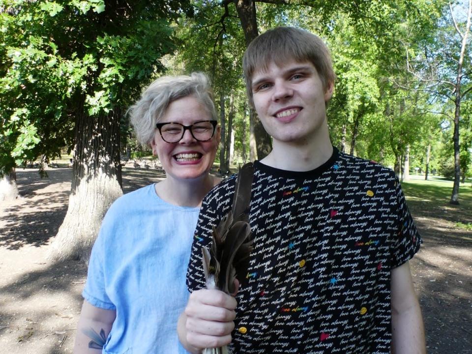 Kalyn Falk has had a hard time finding support workers for her adult son Noah, who has autism and needs support from carers.  (Cameron MacLean/CBC Manitoba - image credit)