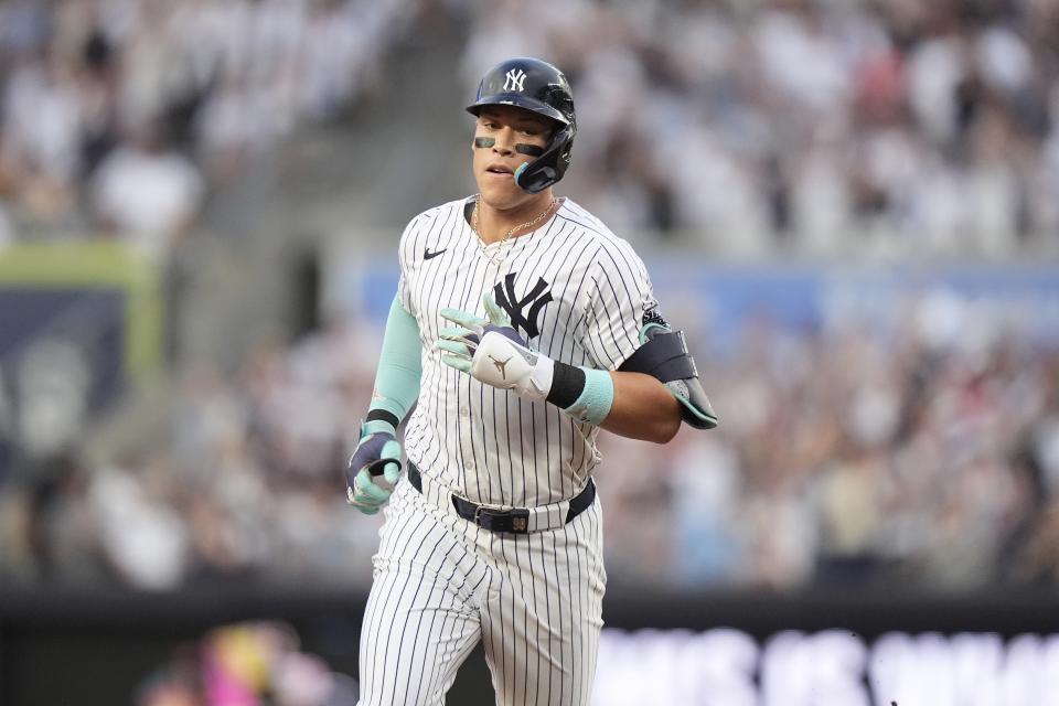 New York Yankees' Aaron Judge runs the bases after hitting a two-run home run during the first inning of a baseball game against the Atlanta Braves, Saturday, June 22, 2024, in New York. (AP Photo/Frank Franklin II)