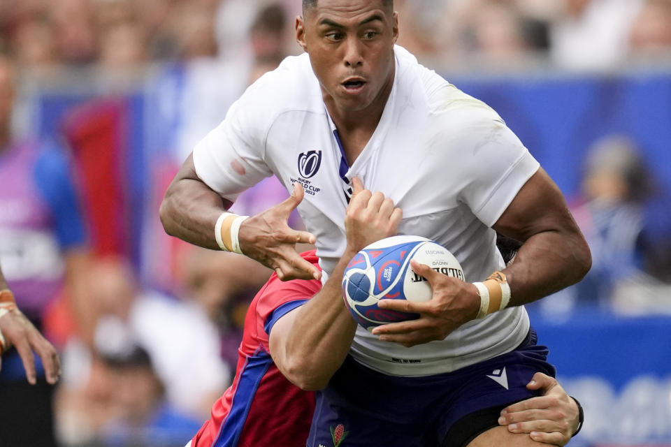 Samoa's Nigel Ah Wong runs with the ball during the Rugby World Cup Pool D match between Samoa and Chile at the Stade de Bordeaux in Bordeaux, France, Saturday, Sept. 16, 2023. (AP Photo/Christophe Ena)