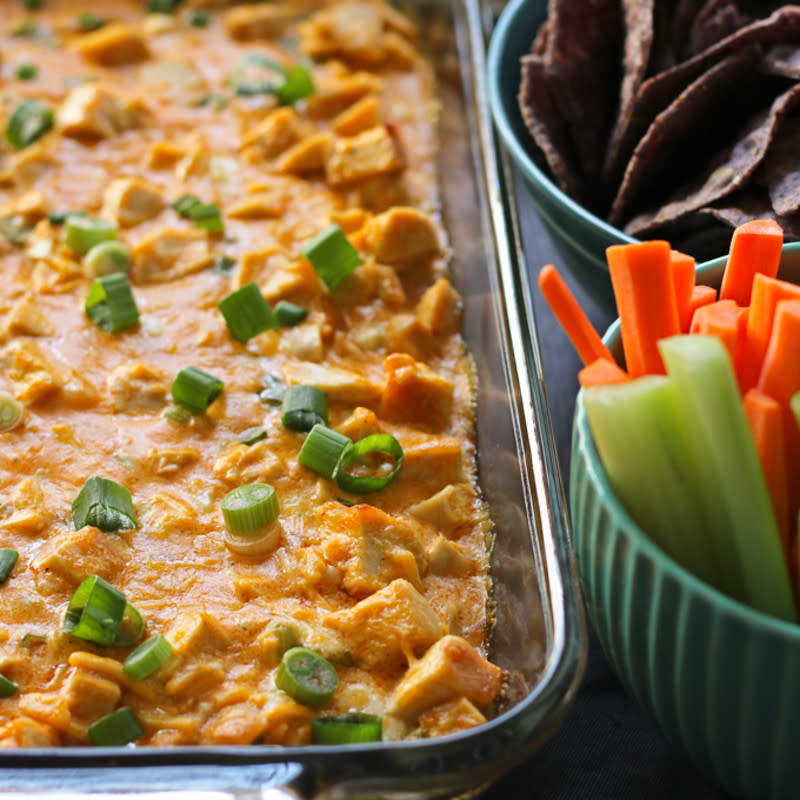 <p>Honey and Birch</p><p>Don't miss out on making this game day classic.</p><p><strong>Get the recipe:<a href="http://www.honeyandbirch.com/buffalo-chicken-dip-recipe/" rel="nofollow noopener" target="_blank" data-ylk="slk:Buffalo Chicken Dip;elm:context_link;itc:0;sec:content-canvas" class="link rapid-noclick-resp">Buffalo Chicken Dip</a></strong></p>