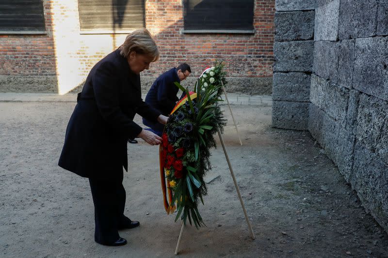 German Chancellor Angela Merkel and Polish Prime Minister Mateusz Morawiecki visit the Auschwitz-Birkenau memorial and museum