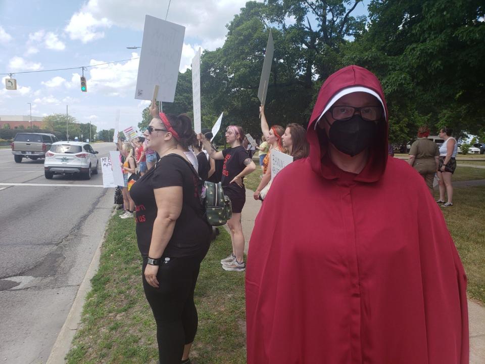 Meredith Mills attends a demonstration supporting abortion rights in Port Huron on Saturday, July 2, 2022.