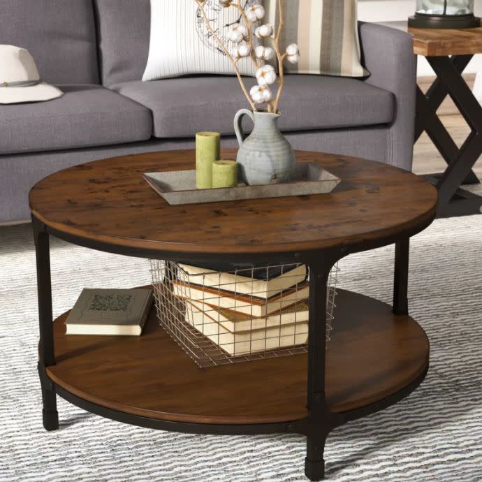 This <a href="https://www.wayfair.com/furniture/pdp/carolyn-coffee-table-lrfy2465.html" target="_blank">open coffee table</a>&nbsp;instantly elevates your favorite space.