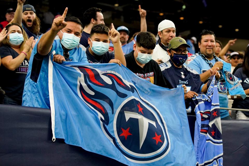 Titans fans celebrate after beating the Texans at NRG Stadium Sunday, Jan. 9, 2022 in Houston, Texas.