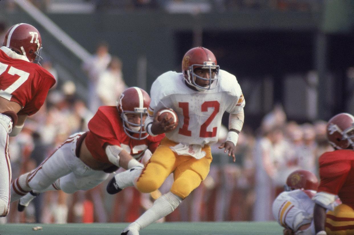 UNITED STATES - SEPTEMBER 23:  College Football: USC Charles White (12) in action, rushing vs Alabama, Birmingham, AL 9/23/1978  (Photo by Heinz Kluetmeier/Sports Illustrated via Getty Images)  (SetNumber: X22729 TK1 R18 F13)