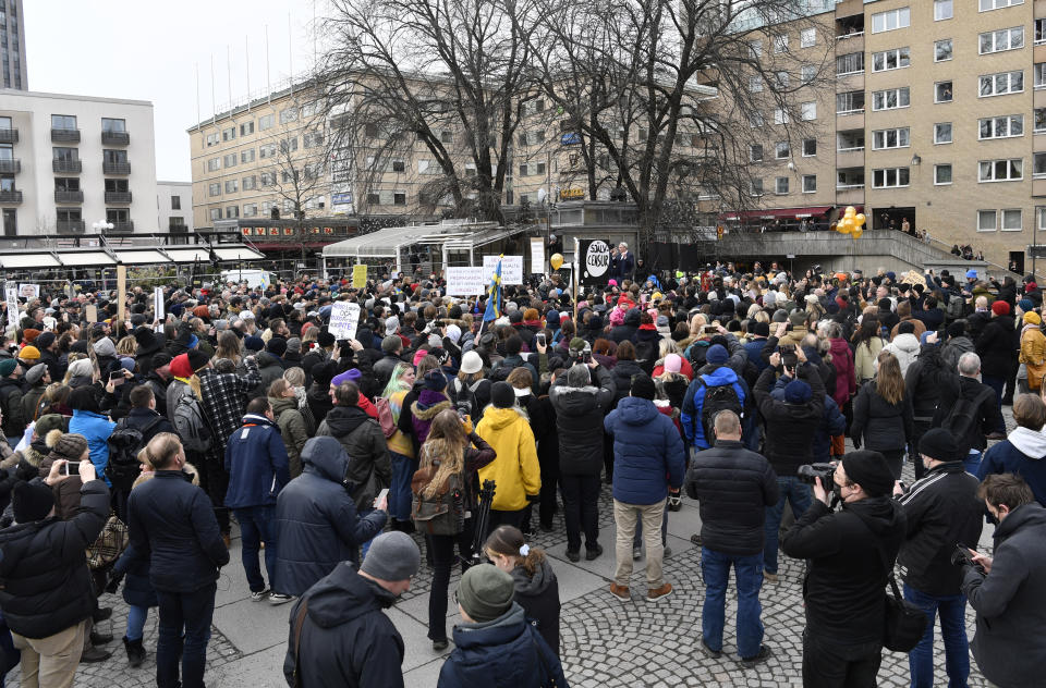 Anti-lockdown protesters demonstrate against coronavirus restrictions in Stockholm Saturday March 6, 2021. The protest was disbanded by police due to lack of permit for the public gathering. (Henrik Montgomery / TT via AP)