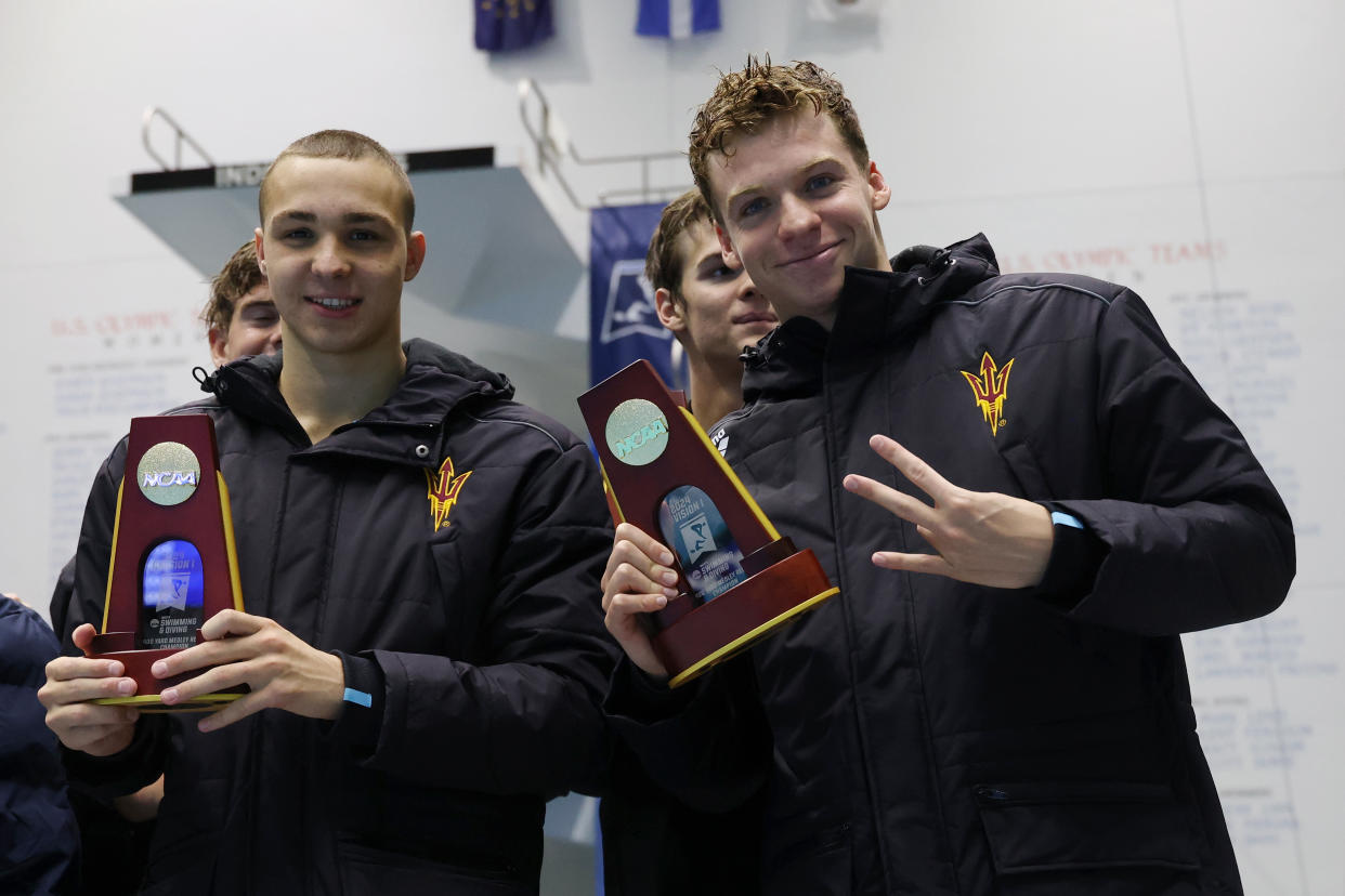 INDIANAPOLIS, INDIANA - MARCH 29: Ilya Kharun and Leon Marchand of Arizona State with teammates after a win in the Men 400 Yard Medley Relay and an NCAA record time of 2:57.32 during the Division I Men's Swimming and Diving Championships at IU Natatorium at IUPUI on March 29, 2024 in Indianapolis, Indiana. (Photo by Joe Robbins/NCAA Photos via Getty Images)
