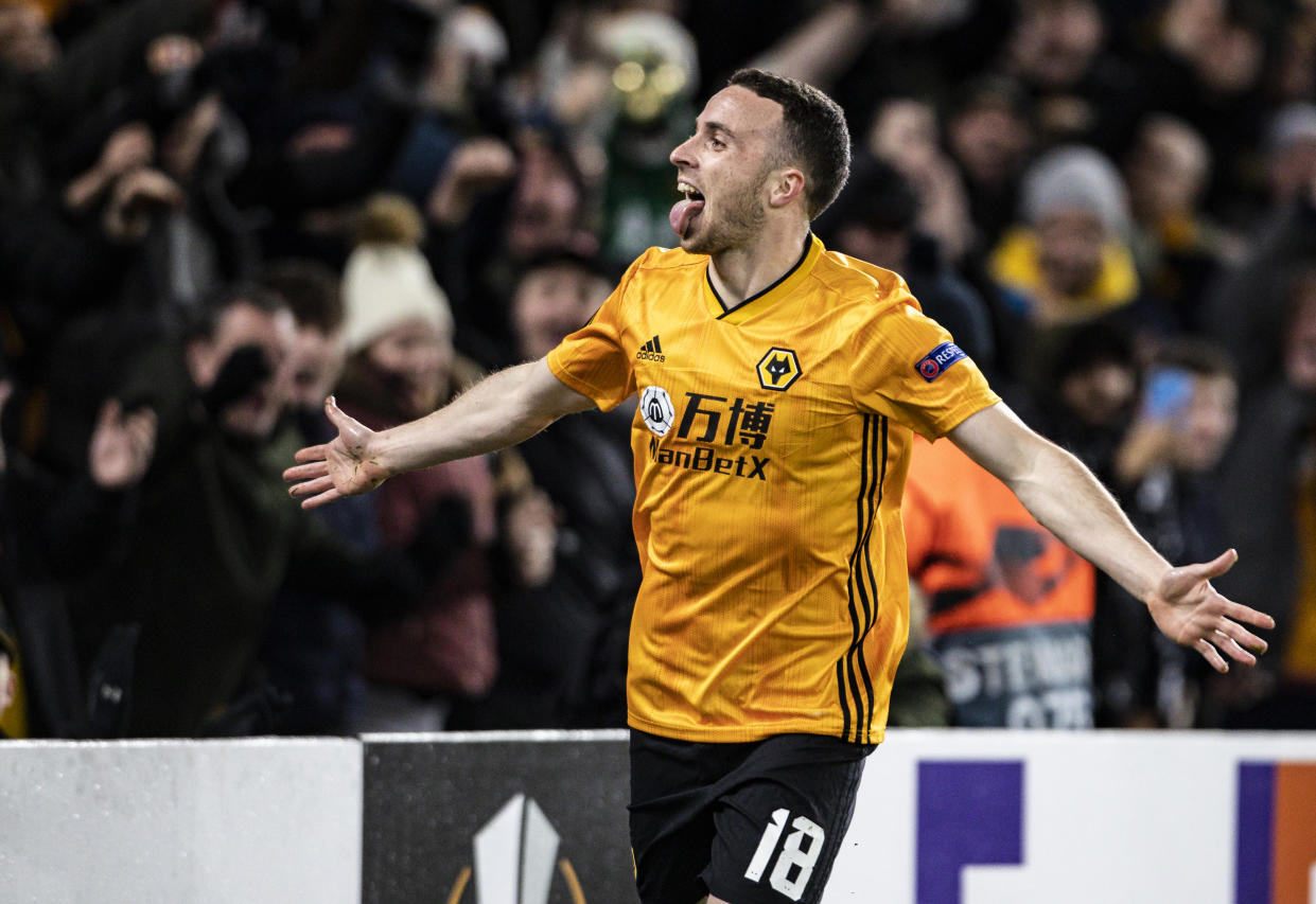 WOLVERHAMPTON, ENGLAND - DECEMBER 12: Wolverhampton Wanderers' Diogo Jota celebrates scoring his side's first goal during the UEFA Europa League group K match between Wolverhampton Wanderers and Besiktas at Molineux on December 12, 2019 in Wolverhampton, United Kingdom. (Photo by Andrew Kearns - CameraSport via Getty Images)