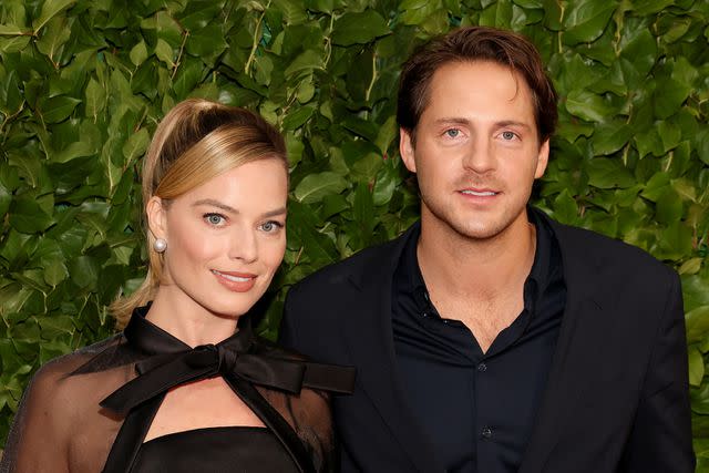 <p>Dia Dipasupil/WireImage</p> Margot Robbie and Tom Ackerly in November 2023