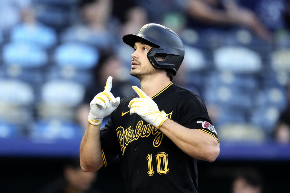 Pittsburgh Pirates' Bryan Reynolds celebrates after hitting a solo home run during the first inning of a baseball game against the Kansas City Royals Wednesday, Aug. 30, 2023, in Kansas City, Mo. (AP Photo/Charlie Riedel)