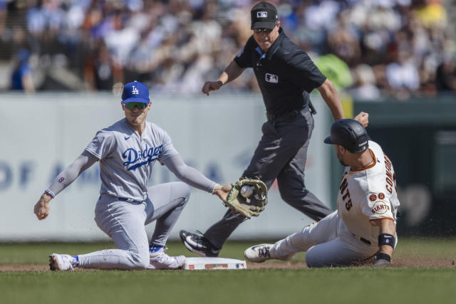 Dodgers ride 3 homers to testy 4-2 win over Giants