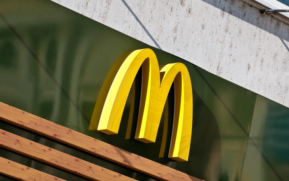 Bratislava, Slovakia - October 2, 2011: McDonald's Golden Arches Logo from a Mc Caf&amp;egrave; store in central square of Bratislava, capital of Slovakia. This food chain entered in Eastern European countries just after the fall of Berlin Wall in 1989