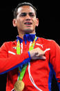 <p>Gold medalist Robeisy Ramirez of Cuba poses during the medal ceremony for the Men’s Bantam (56kg) on Day 15 of the Rio 2016 Olympic Games at Riocentro – Pavilion 6 on August 20, 2016 in Rio de Janeiro, Brazil. (Photo by Dean Mouhtaropoulos/Getty Images) </p>