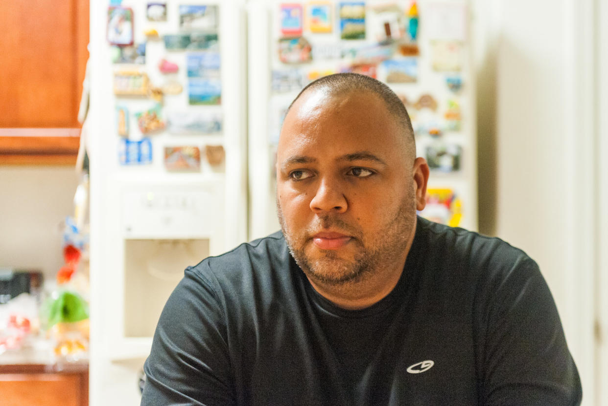 Omar Delgado poses for a photo at his home in the Orlando, Florida, area. (Photo: Chris McGonigal/HuffPost)