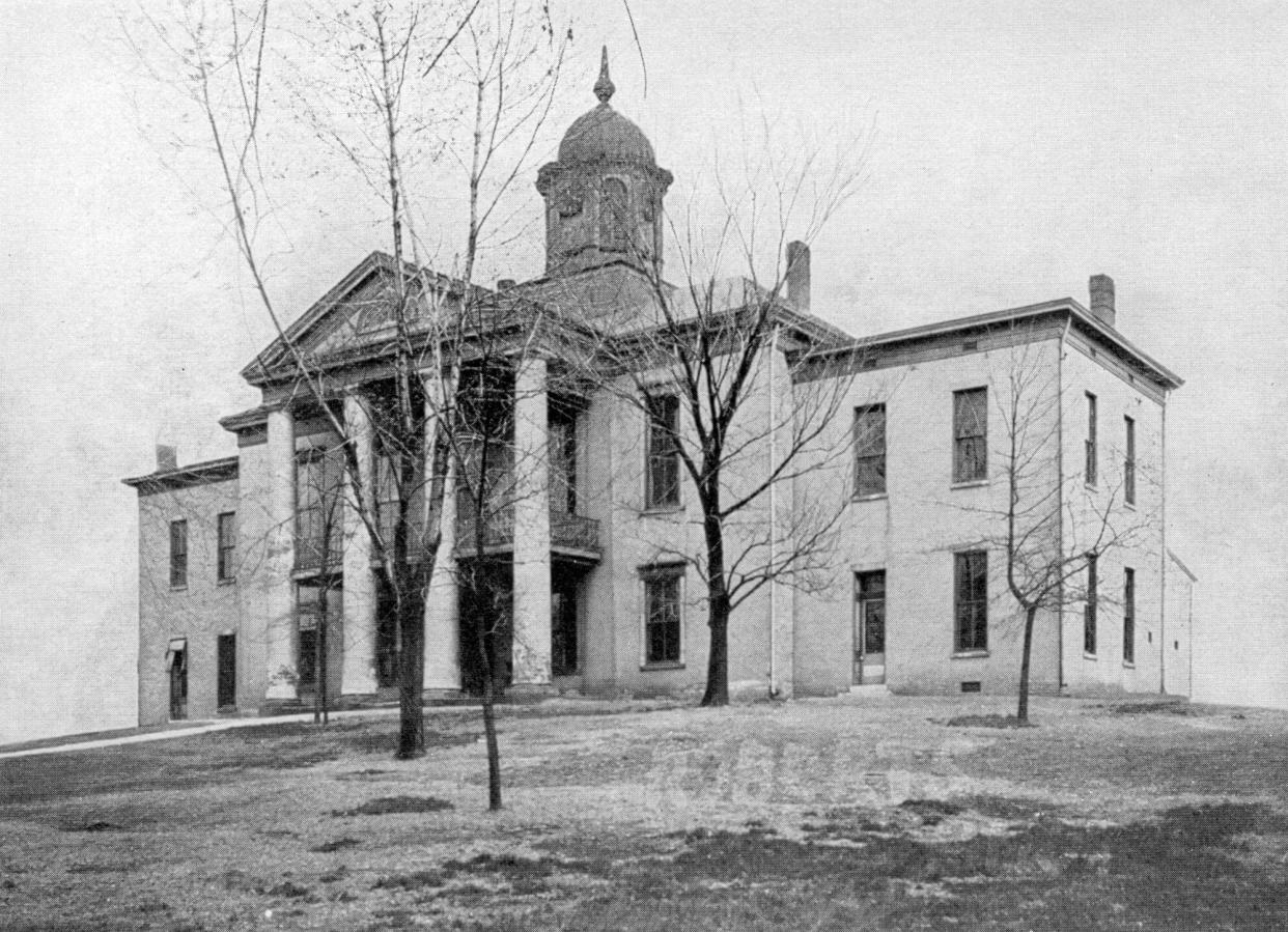 Warring factions of the Henderson County Democratic Party held two different conventiions in May 1924. One was held in the circuit courtroom of the 1843 courthouse, depicted here from about 1911, and the other was held outside on the lawn.