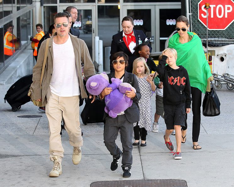 Brad Pitt Angelina Jolie and the family land at LAX Airport