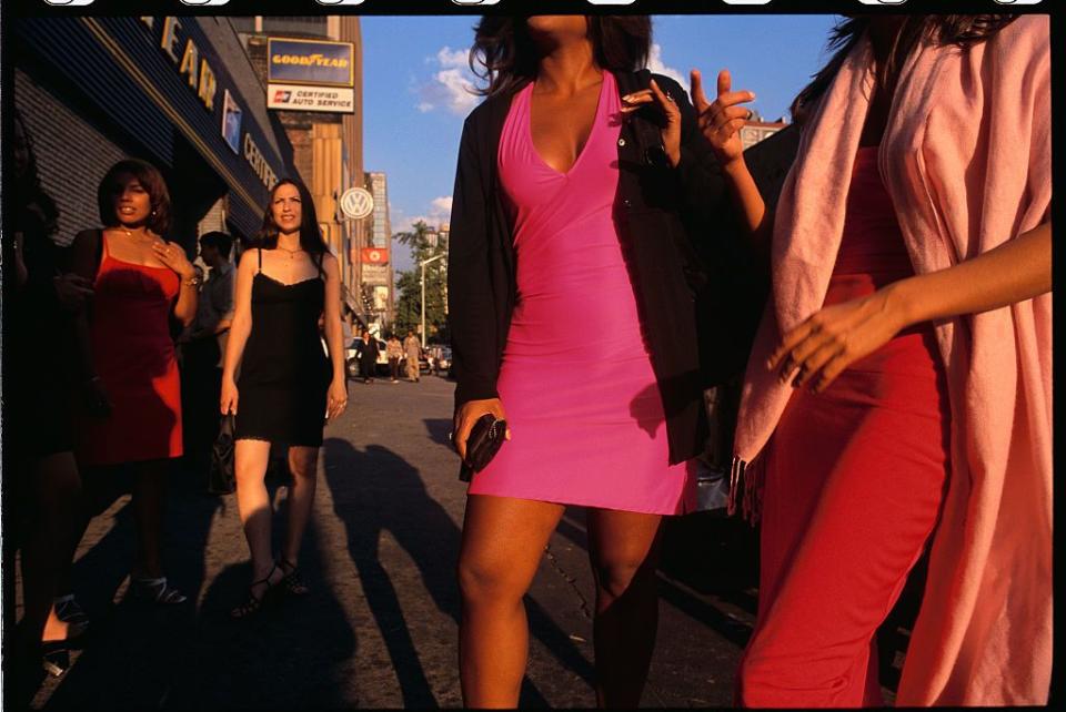 women standing outside a nightclub