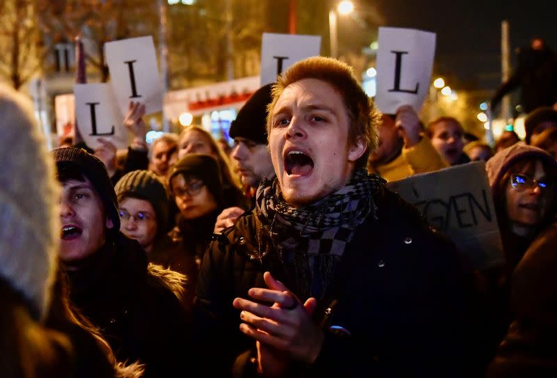 Hungarians protest demanding higher wages for teachers and against dismissals, in Budapest