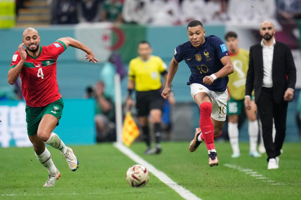 Sofyan Amrabat in action against Kylian Mbappe (AP)