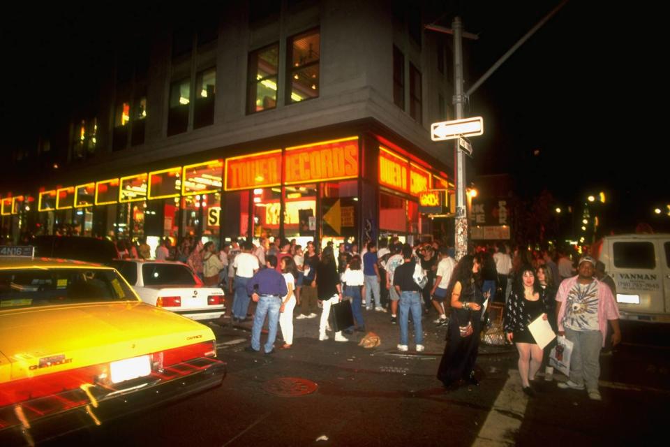 Guns N' Roses fans wait outside Tower Records at midnight to buy the just-released albums Use Your Illusion I and Use Your Illusion II in New York City on Sept. 23, 1991.