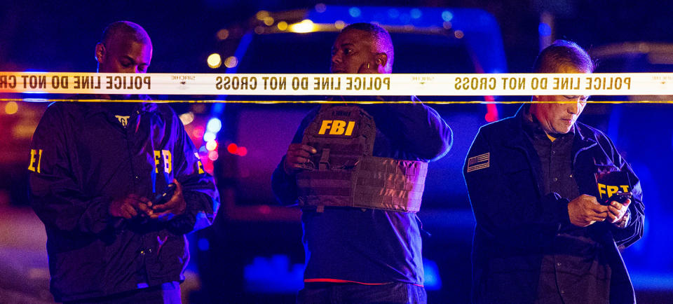 <p>FBI agents work the scene of an explosion in Austin, Texas, Sunday, March 18, 2018. At least a few people were injured in another explosion in Texas’ capital late Sunday, after three package bombs detonated this month in other parts of the city, killing two people and injuring two others. (Photo: Nick Wagner/Austin American-Statesman via AP) </p>