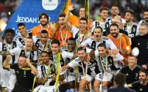 Soccer Football - Italian Super Cup - Juventus v AC Milan - King Abdullah Sports City, Jeddah, Saudi Arabia - January 16, 2019 Juventus' Cristiano Ronaldo, Miralem Pjanic, Blaise Matuidi, Paulo Dybala and team mates celebrate winning the Italian Super Cup REUTERS/Waleed Ali