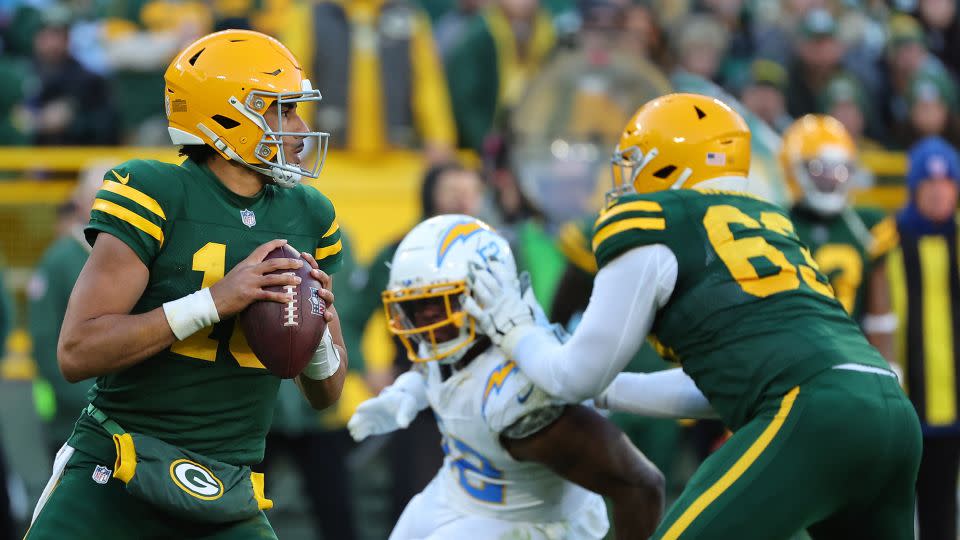 Green Bay Packers quarterback Jordan Love drops back to pass during a game against the Los Angeles Chargers at Lambeau Field on November 19. - Stacy Revere/Getty Images