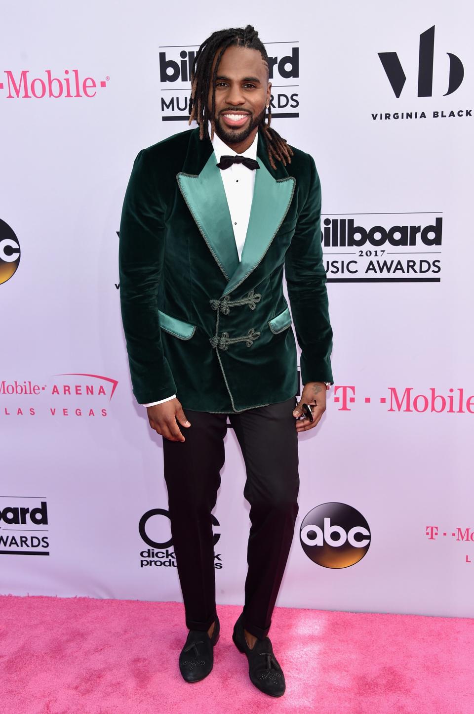 <p>We would describe Jason Derulo's personal style as "Liberace goes to the club". Given that, this emerald green tuxedo look is pretty par for the course. Hey, at least he knows who he is!</p>