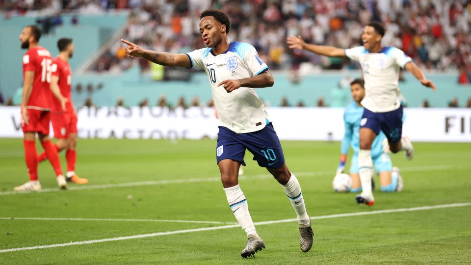 Raheem Sterling celebrates scoring for England against Iran at the 2022 FIFA World Cup. - Julian Finney/Getty Images