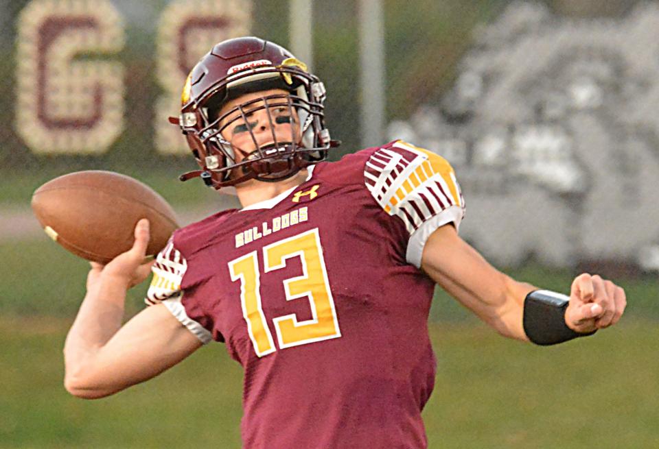 De Smet quarterback Britt Carlson throws a pass in pre-game warmups prior to their first-round state Class 9B high school football playoff game against Colome on Thursday, Oct. 19, 2023 at De Smet.