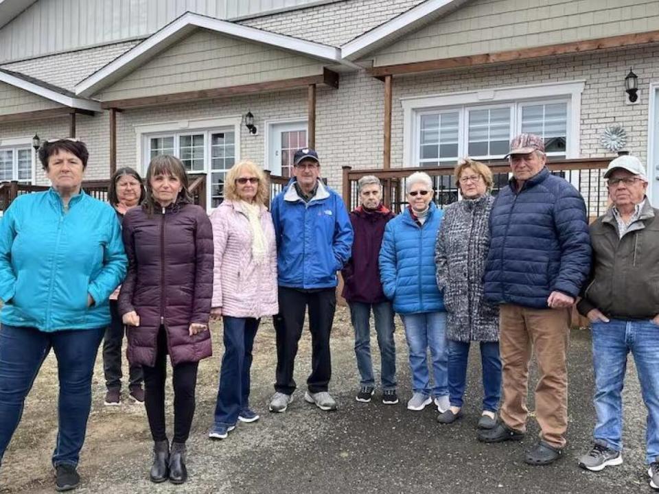 These renters in Campbellton were told they would have to vacate their apartments, but the eviction notices have been cancelled.  (Serge Bouchard/Radio-Canada - image credit)