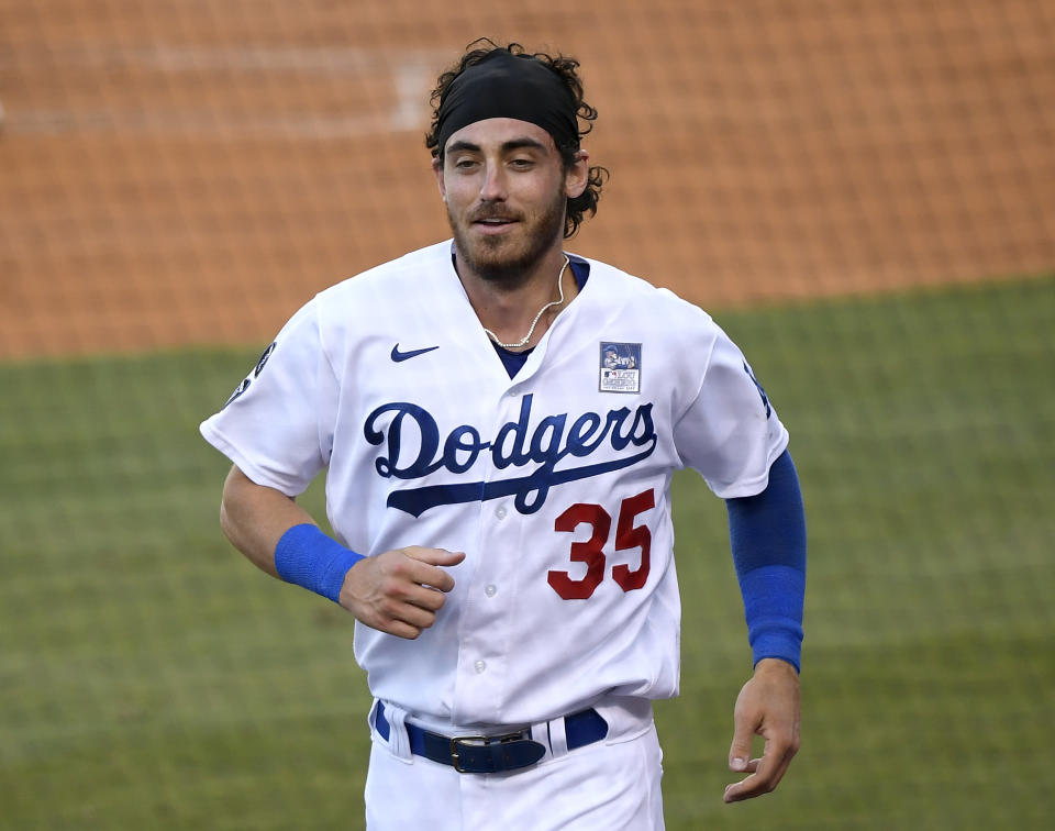 LOS ANGELES, CALIFORNIA - JUNE 02: Cody Bellinger #35 of the Los Angeles Dodgers reacts after scoring his run on a throwing error from Edmundo Sosa #63 of the St. Louis Cardinals, to take a 4-1 lead, during the first inning at Dodger Stadium on June 02, 2021 in Los Angeles, California. (Photo by Harry How/Getty Images)