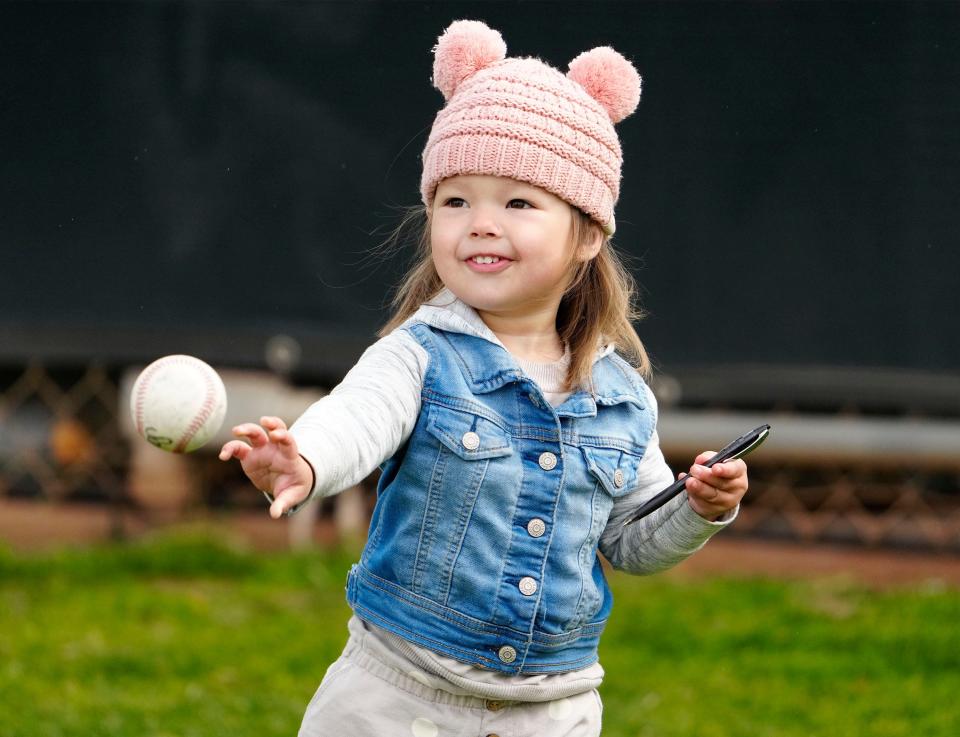 Sawyer Joubert, age 2 from Mesa, tosses a baseball last week during a visit to watch the Arizona Diamondbacks during spring training workouts at Salt River Fields. 
 Rob Schumacher/The Republic
Feb 21, 2023; Scottsdale, AZ, USA; Sawyer Joubert, age 2 from Mesa, tosses a baseball during a visit to watch the Arizona Diamondbacks during spring training workouts at Salt River Fields. Mandatory Credit: Rob Schumacher-Arizona Republic