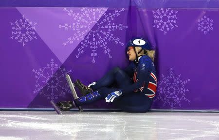 Short Track Speed Skating Events - Pyeongchang 2018 Winter Olympics - Women's 1000m Competition - Gangneung Ice Arena - Gangneung, South Korea - February 20, 2018. Elise Christie of Britain reacts after falling. REUTERS/Phil Noble