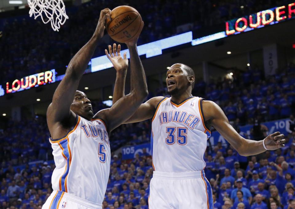 Cleveland Cavaliers forward Kendrick Perkins compliments Golden State Warriors forward Kevin Durant with expletive after Game 3 of the NBA Finals. (AP Photo)