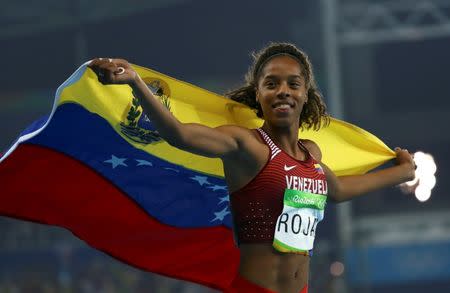 2016 Rio Olympics - Athletics - Final - Women's Triple Jump Final - Olympic Stadium - Rio de Janeiro, Brazil - 14/08/2016. Yulimar Rojas (VEN) of Venezuela celebrates winning the silver medal in the event REUTERS/Leonhard Foeger