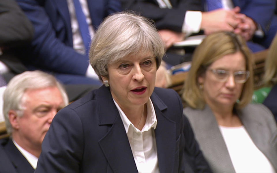 Britain's Prime Minister Theresa May speaks in the House of Commons in London in this image taken from video Wednesday March 29, 2017. May will announce to Parliament that Britain is set to formally file for divorce from the European Union Wednesday, ending a 44-year relationship, enacting the decision made by U.K. voters in a referendum nine months ago and launching both Britain and the bloc into uncharted territory. (Parliamentary Recording Unit via AP)