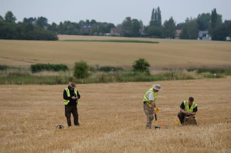 Army veterans and archeologists dig as part of archaeological research campaign called "Waterloo Uncovered" in Waterloo