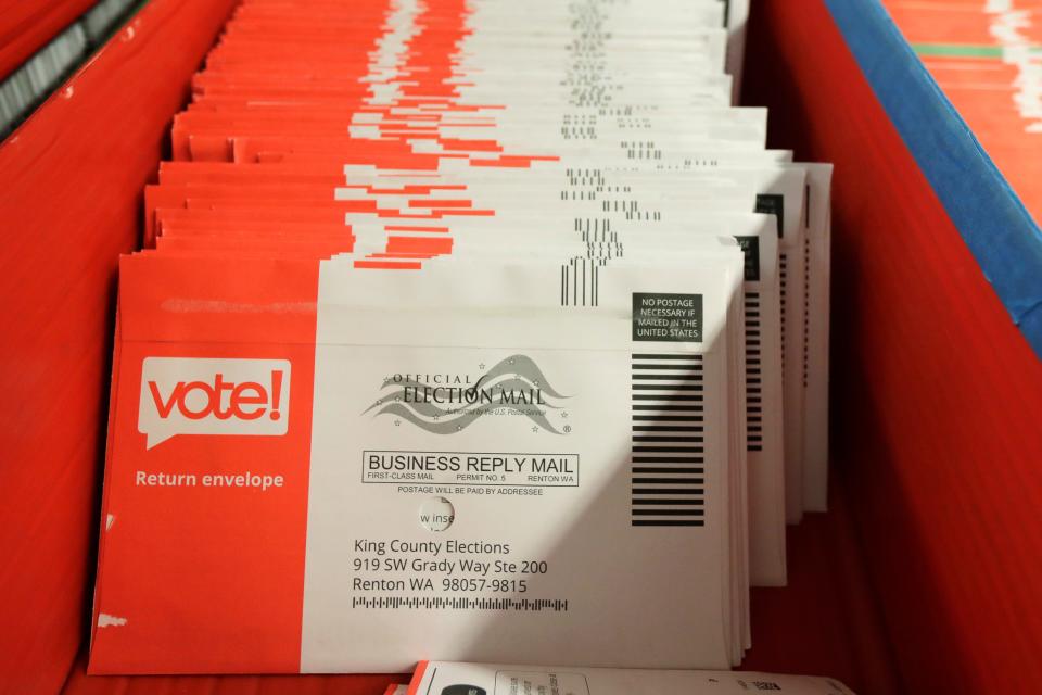 Vote-by-mail ballots on Aug. 5, 2020, at a elections headquarters in Renton, Washington.