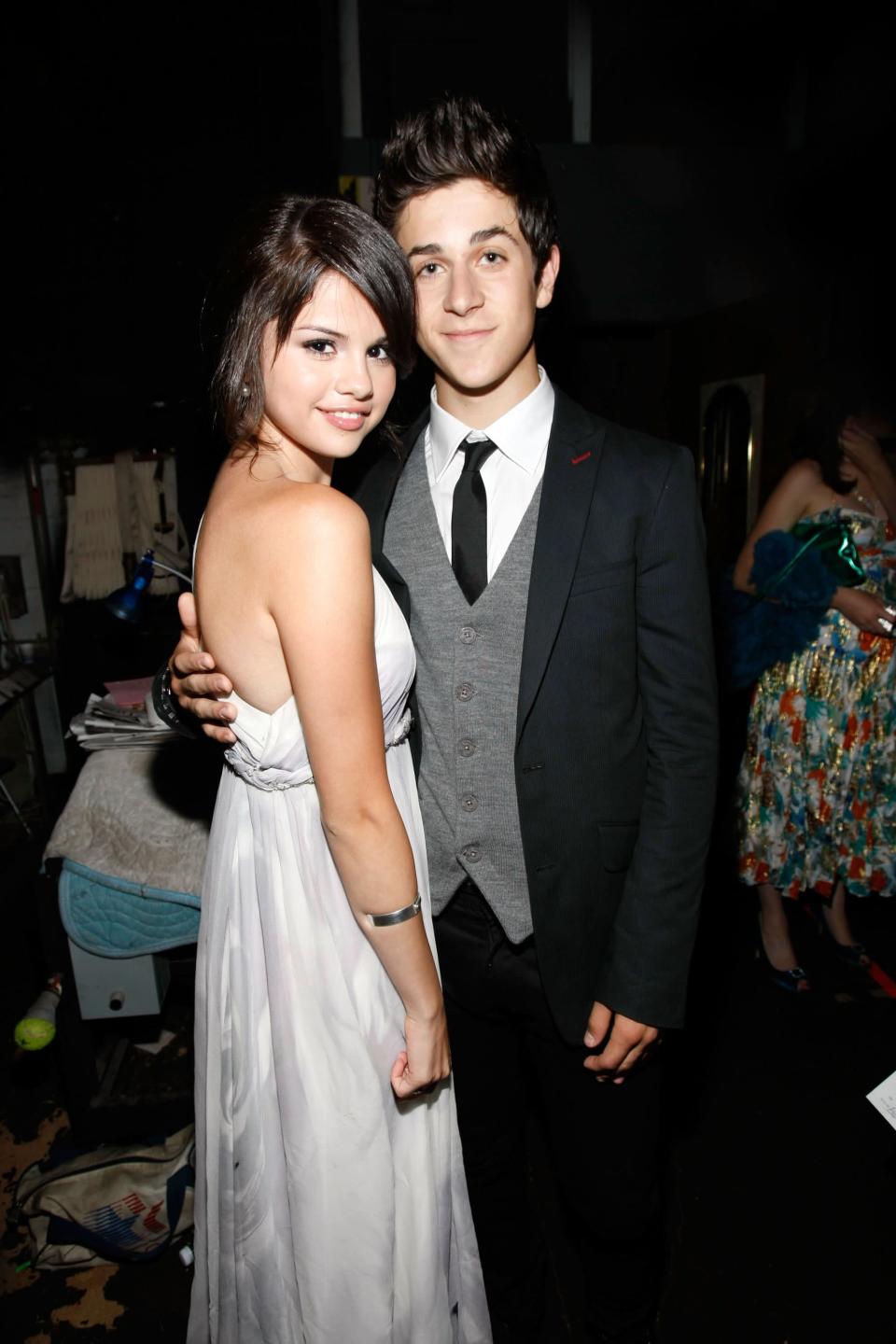<p>Henrie played Gomez's TV brother on Disney Channel's "Wizards of Waverly Place," and the two <a href="https://www.popsugar.com/celebrity/Selena-Gomez-David-Henrie-Disneyland-July-2018-45011679" class="link " rel="nofollow noopener" target="_blank" data-ylk="slk:remained good friends">remained good friends</a> after the show ended in 2012. In 2014, <a href="https://www.seventeen.com/celebrity/a25693/selena-gomez-david-henrie-date/" class="link " rel="nofollow noopener" target="_blank" data-ylk="slk:Seventeen reported">Seventeen reported</a> that they went on a date, but it appears nothing ever came of it. In 2017, <a href="https://www.popsugar.com/celebrity/Selena-Gomez-David-Henrie-Wedding-Pictures-43462785" class="link " rel="nofollow noopener" target="_blank" data-ylk="slk:Gomez attended Henrie's wedding">Gomez attended Henrie's wedding</a> where he tied the knot with model Maria Cahill, with whom he shares his <a href="https://www.popsugar.com/family/David-Henrie-Maria-Cahill-Welcome-First-Baby-2019-45940889" class="link " rel="nofollow noopener" target="_blank" data-ylk="slk:3-year-old daughter Pia">3-year-old daughter Pia</a> and 1-year-old son James. Gomez and Henrie <a href="https://www.popsugar.com/entertainment/david-henrie-wizards-of-waverly-place-interview-47711014" class="link " rel="nofollow noopener" target="_blank" data-ylk="slk:reunited again in August 2020">reunited again in August 2020</a> to promote their film "<a href="https://www.popsugar.com/entertainment/david-henrie-this-is-the-year-film-interview-47721878" class="link " rel="nofollow noopener" target="_blank" data-ylk="slk:This Is the Year">This Is the Year</a>," which the latter directed and the former produced.</p>
