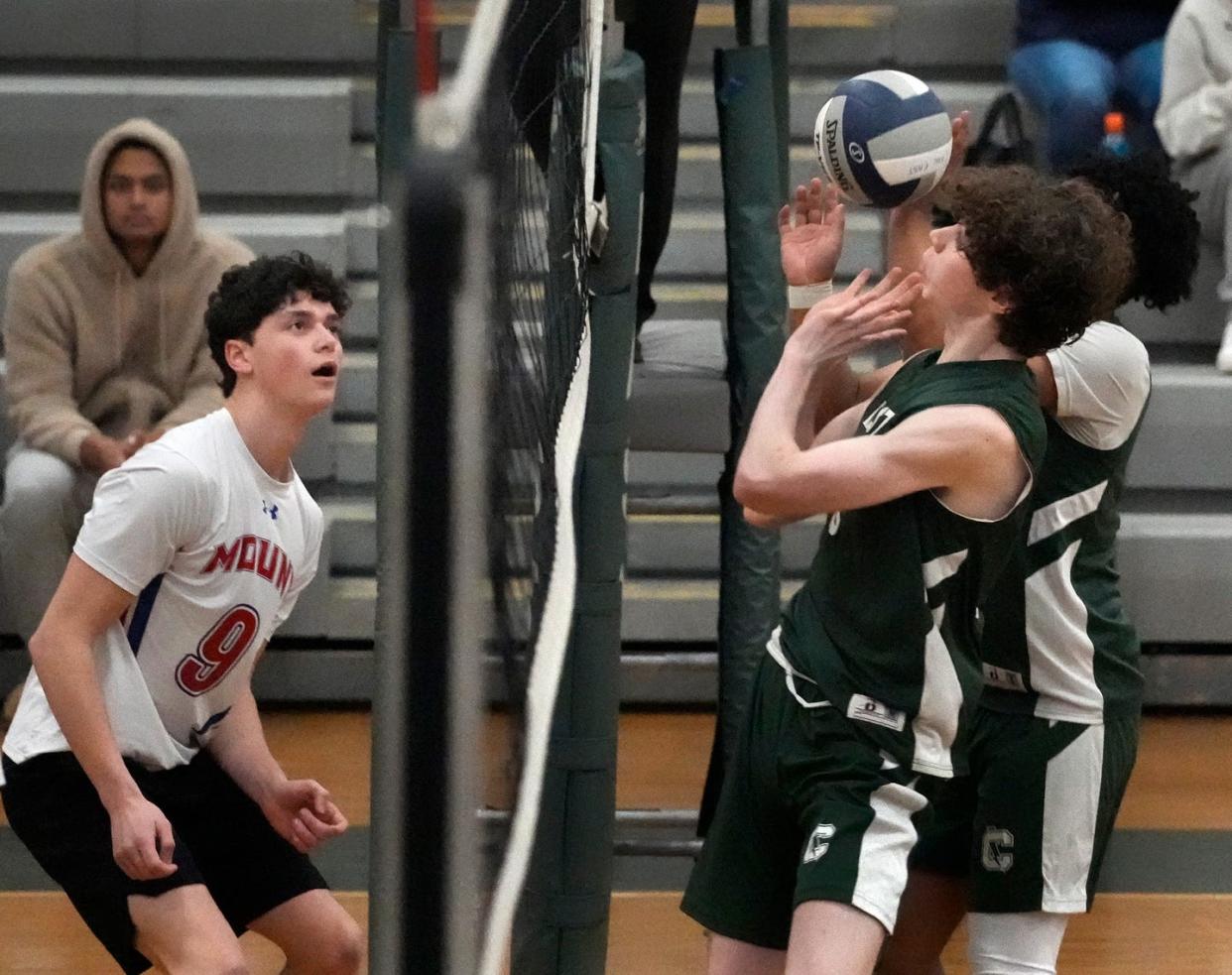 Carter Deslauriers watches as Cranston East defenders Jackson Rennick and Sylus Phang struggle to control a ball on the Thunderbolts side last year.